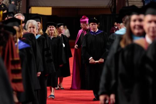 051225 AMC Commencement MW-0600