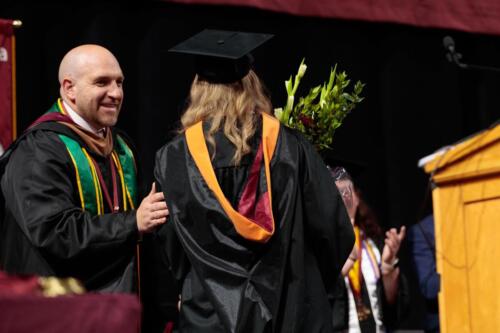 051225 AMC Commencement MW-0743